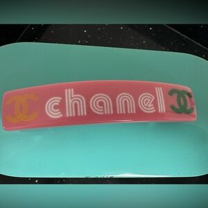 CHANEL Pink Logo Hair Clip with Gold and Green Accents-Authentic. Never worn